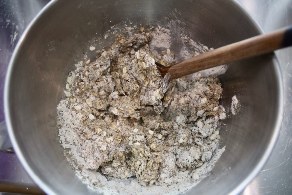 a bowl of the chia bread where the flour is coming together